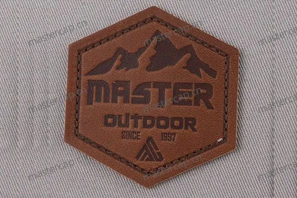 ML003 Top-grain leather patch with brown debossing (sew-on)