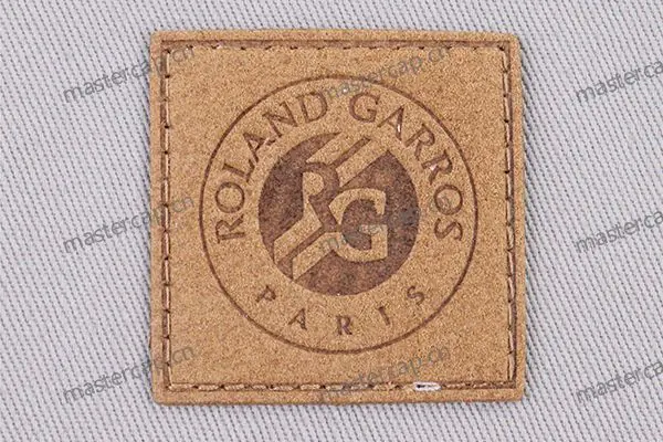 ML008 Microfiber suede patch with brown debossing (sew-on)