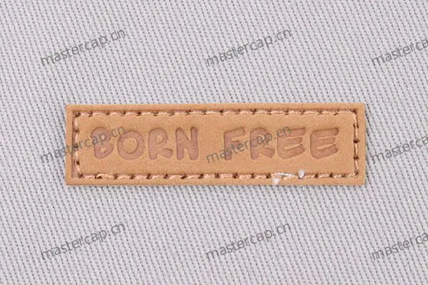 ML011 PU leather patch with tonal debossing (sew-on)
