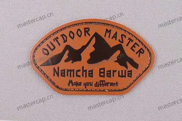 ML016 Split-leather patch with black debossing (sew-on)