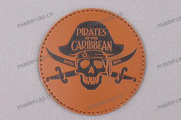 ML018 Top-grain leather patch with brown debossing (sew-on)
