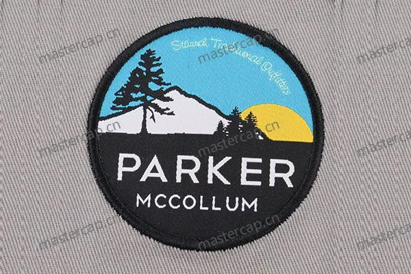 MW004 Woven patch applique with satin-stitch edging