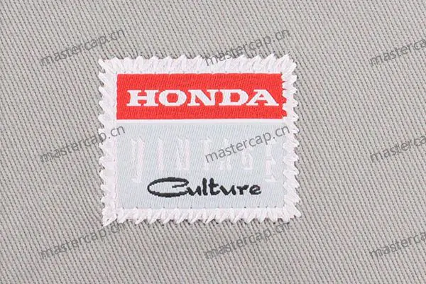 MW008 Woven patch applique with zigzag-stitch edging