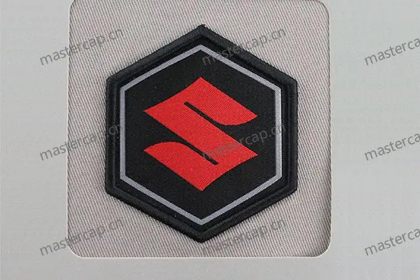 MW010 Woven patch applique with raised 3D embroidered edging