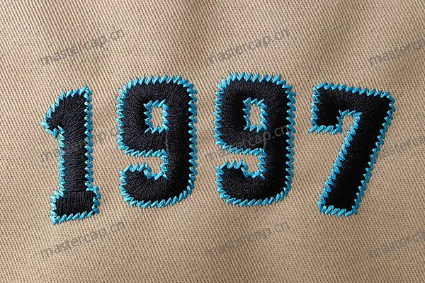 ME006 Low-profile raised embroidery (2D embroidery) with zigzag-stitch edging