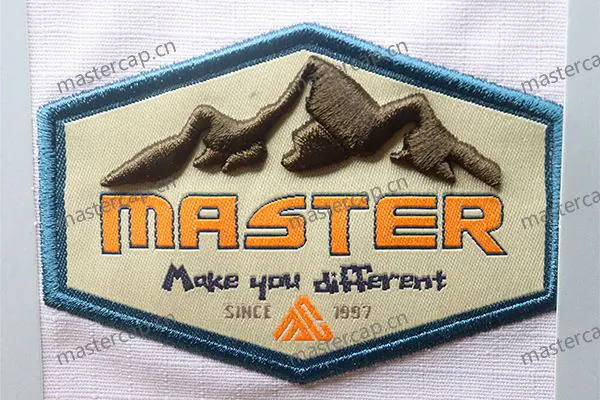 ME031 Woven patch applique with raised embroidery