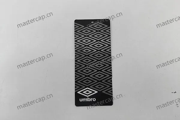 MHT027 400 gsm matte-laminated, double-sided printed folded art-paper hangtag with spot UV varnish and plastic loop-lock pin