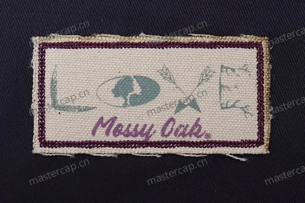 MP013 Rubber-printed canvas patch with chain-stitch edging and a raw edge