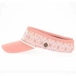 Pink golf visor with raised silicone side badge