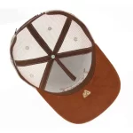 P525 trucker cap interior with stretch sweatband and branded seam tape