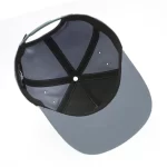 Golf performance cap interior with stretch sweatband and branded seam tape