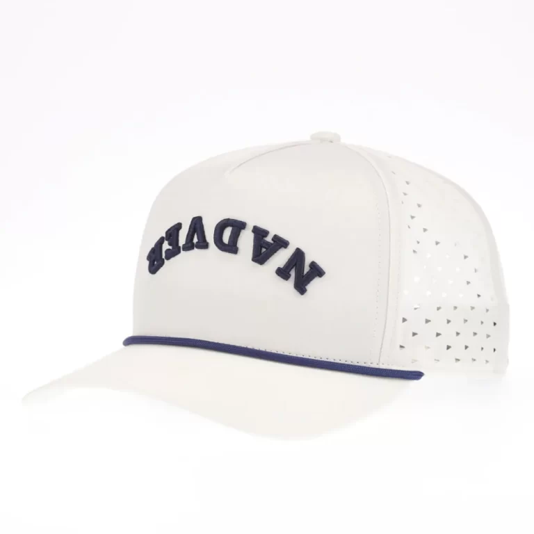 Ivory golf performance rope cap with navy 3D embroidery and laser perforations, front angle