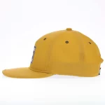 Golf performance cap with reinforced laser-cut eyelets, side view