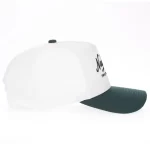 Ivory and dark-green golf performance cap, opposite-side view