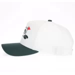 Two-tone golf performance cap with four-way stretch crown, side view