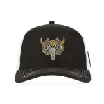Black and white P525 trucker cap with floral bull-skull embroidery, front view