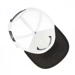 P525 trucker cap interior with printed front-panel lining and curved visor