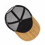 Five-panel trucker cap interior with mesh back and straw visor