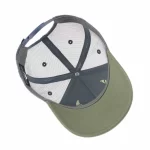 P525 trucker cap interior with printed front-panel lining and visor underside