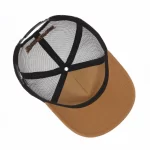 Interior of custom 5-panel trucker cap with structured front and black mesh panels