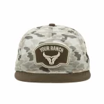 Front view of custom P915 camo mesh trucker cap with embroidered patch