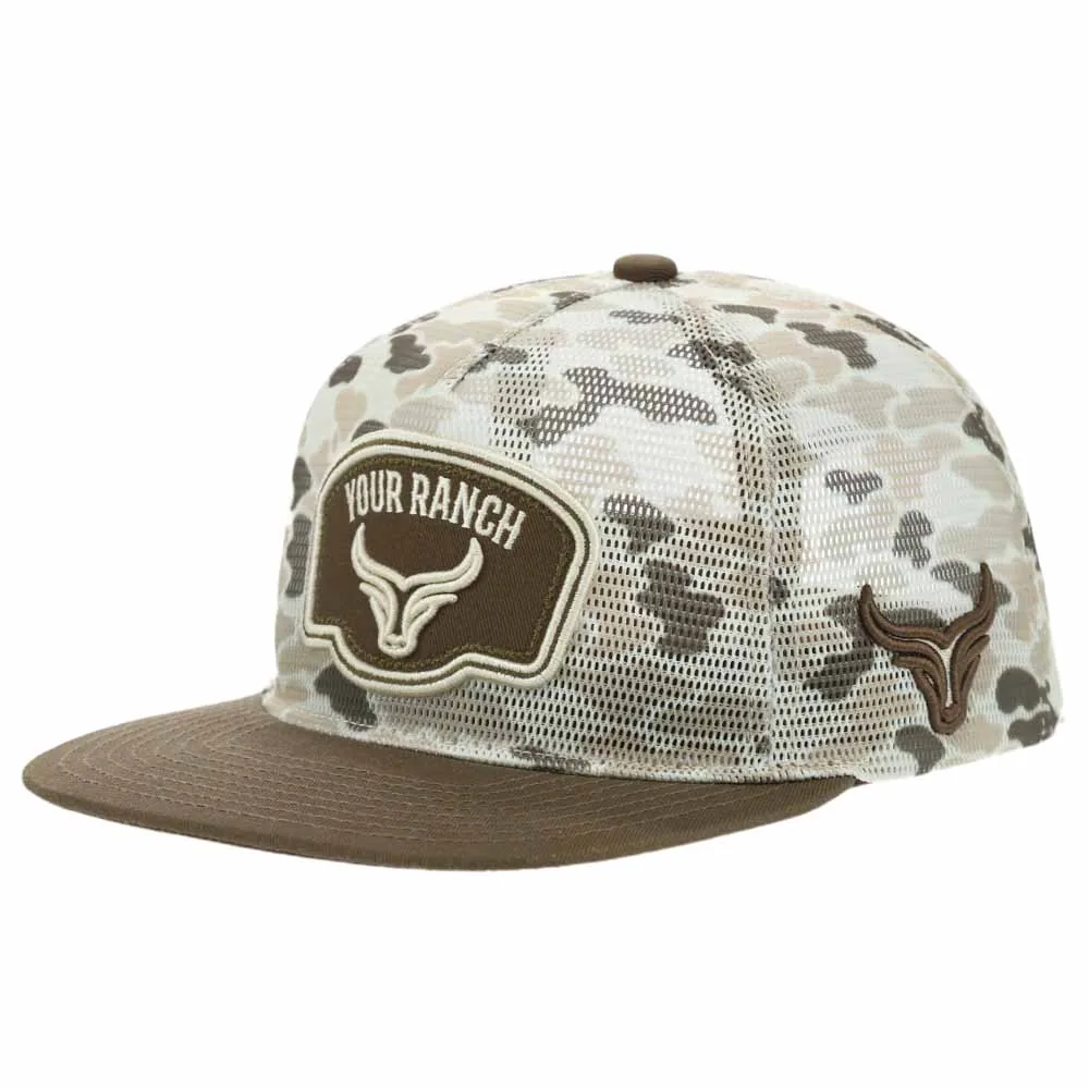 Front angle of custom P915 camo mesh trucker cap with embroidered patch