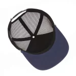 Interior of structured canvas and mesh five-panel trucker hat
