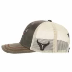 Side detail of custom P406 waxed canvas trucker cap with raised embroidery