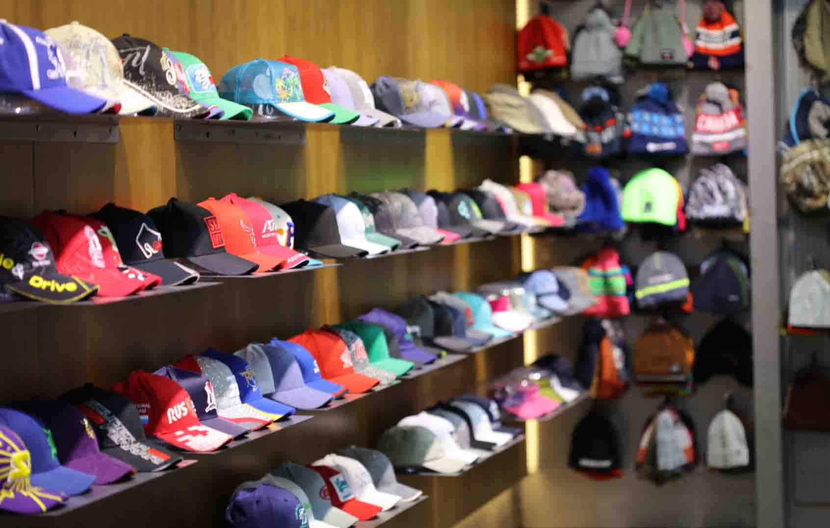 Display of custom caps in different styles, colors and constructions at MasterCap