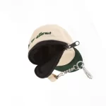 Black-lined interior of miniature cap-shaped zipper pouch