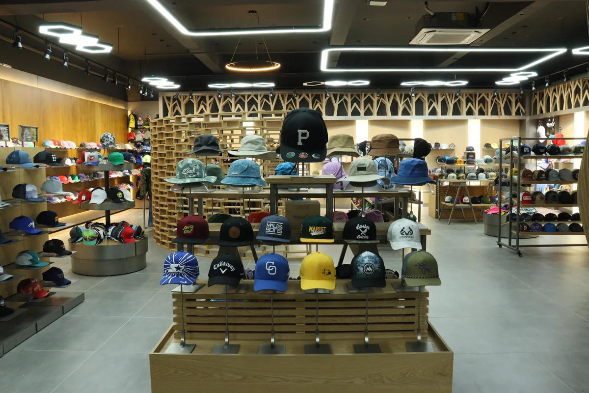 MasterCap Dongguan showroom displaying custom headwear samples