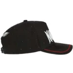 Right-side view of black structured cap with rhinestones and red visor stitching